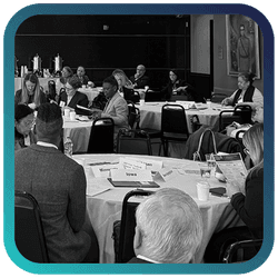 Image of people at tables