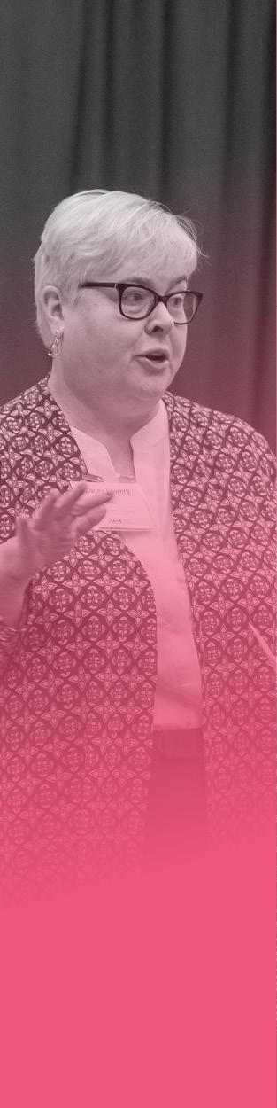 Image of a woman standing and speaking